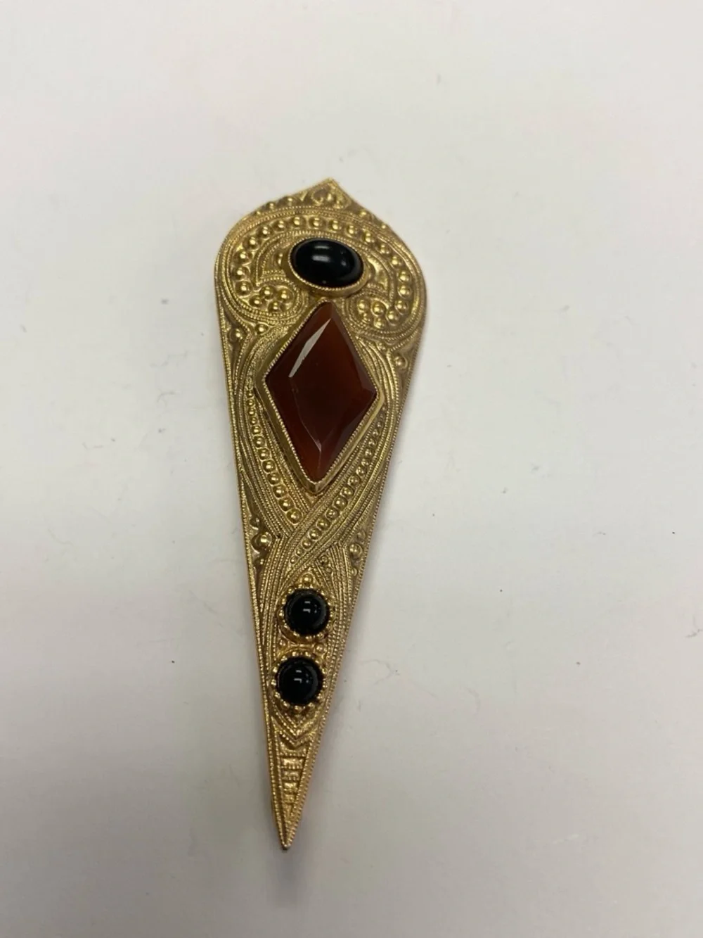 Gold-Tone Filigree Pin with Brown and Black Stones